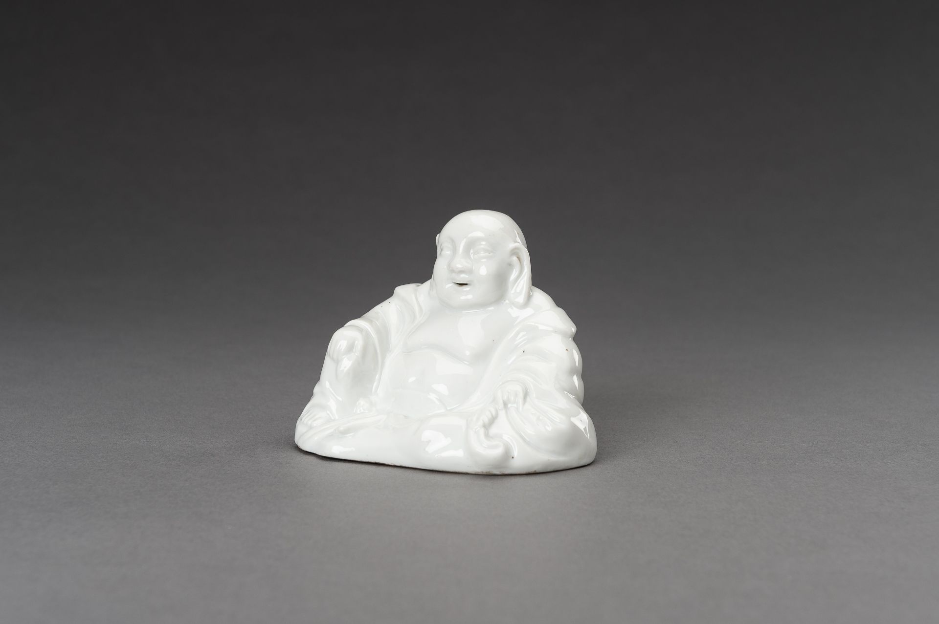 A BLANC DE CHINE PORCELAIN FIGURE OF BUDAI, c. 1920s - Image 3 of 11