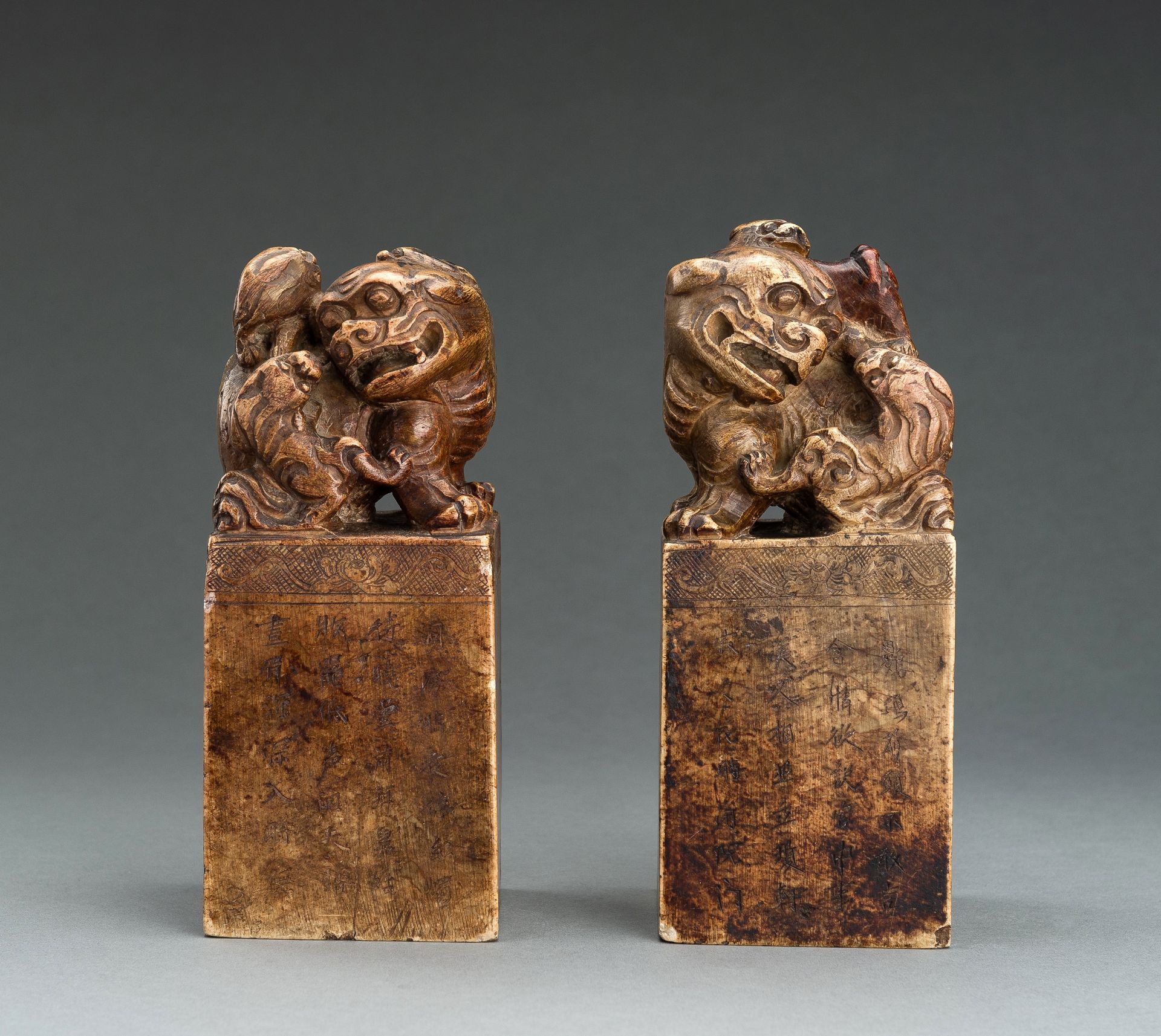 A LARGE PAIR OF 'BUDDHIST LIONS' SOAPSTONE SEALS