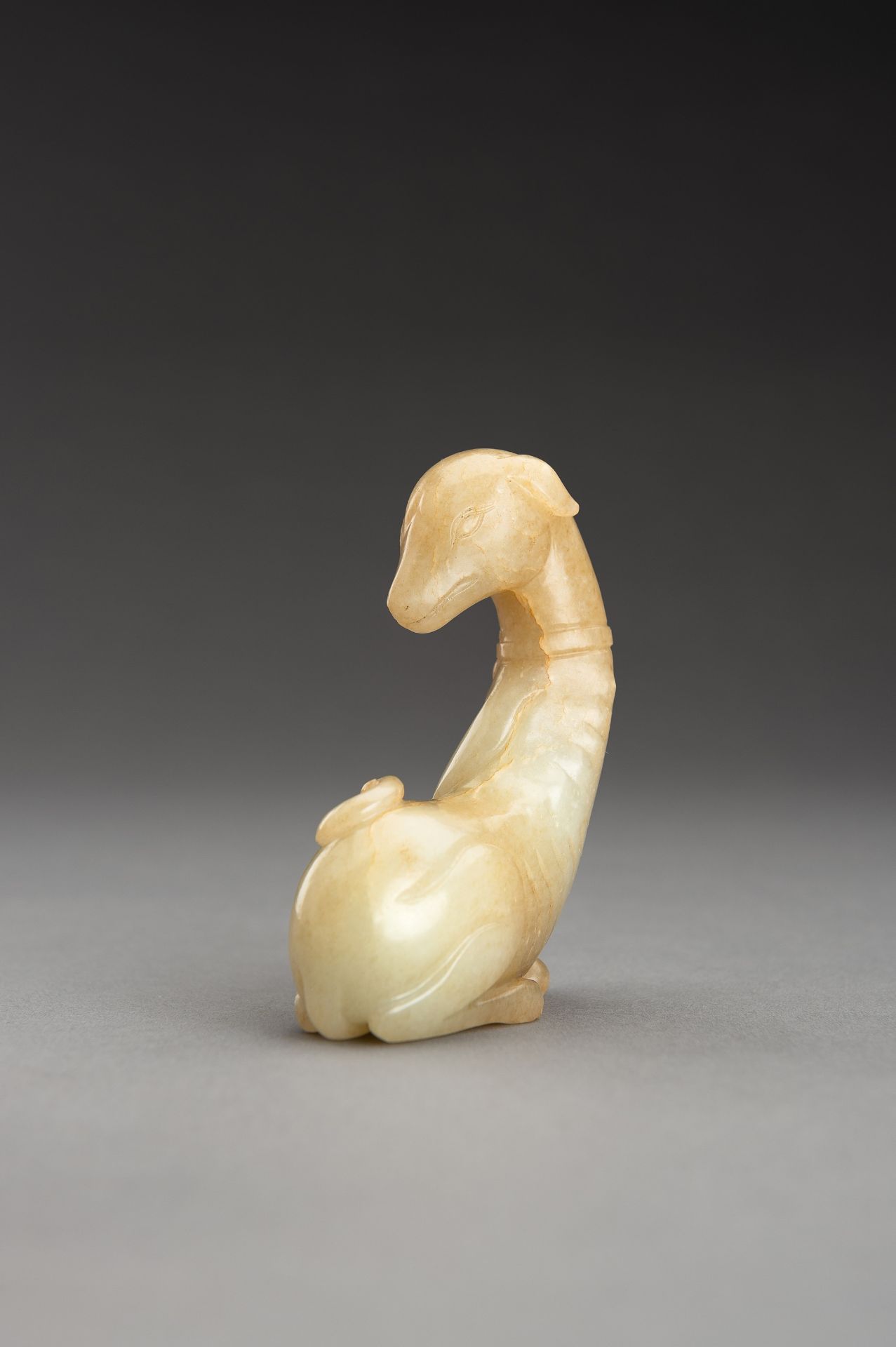 A PALE YELLOW JADE FIGURE OF A DOG, QING - Bild 11 aus 12