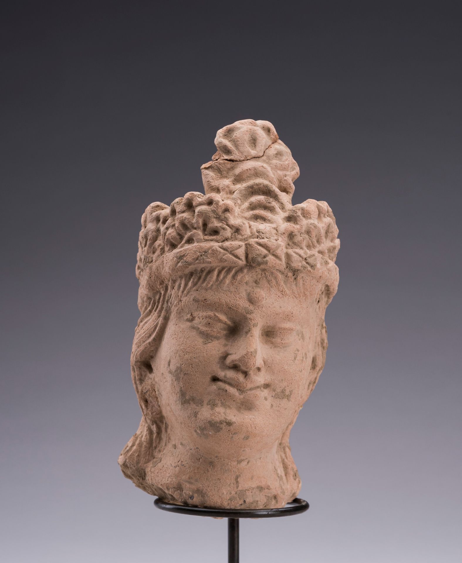 A SMALL TERRACOTTA HEAD OF MAITREYA, GANDHARA