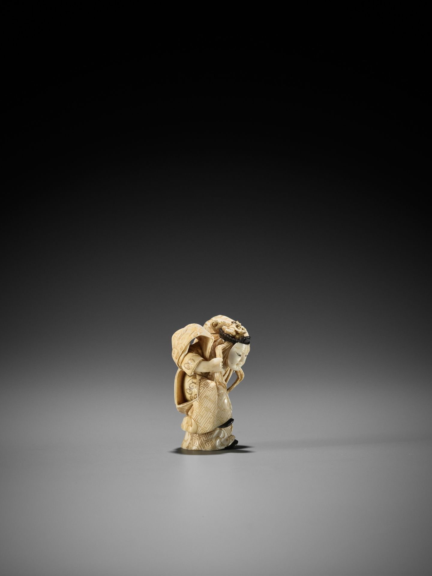 SEIZAN: A FINE TOKYO SCHOOL IVORY NETSUKE OF A GIGAKU PERFORMER - Image 8 of 13