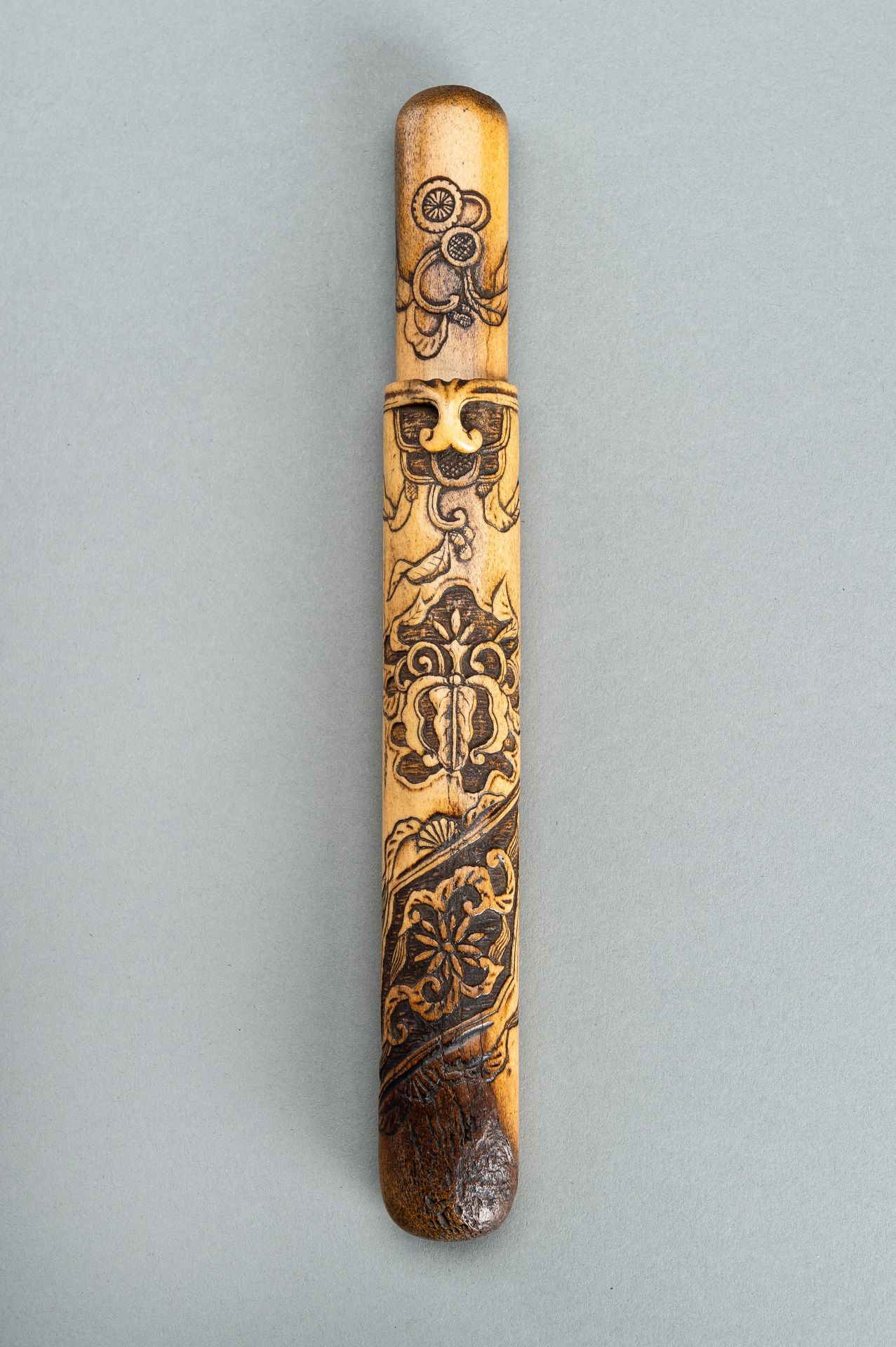 A STAG ANTELR KISERUZUTSU WITH FLORAL DESIGNS