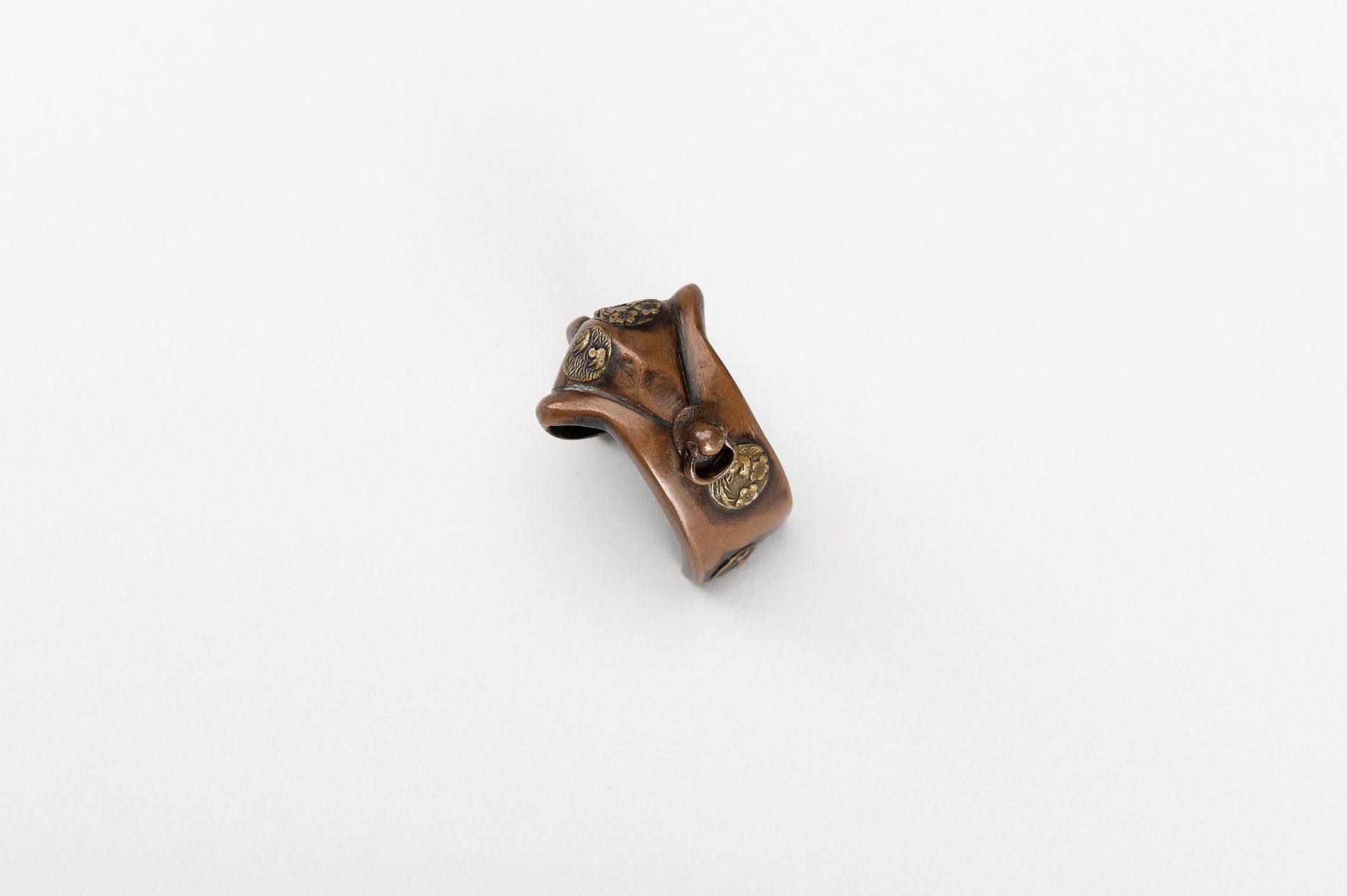 A MIXED METAL NETSUKE OF AN ABUMI (STIRRUP) - Image 8 of 11