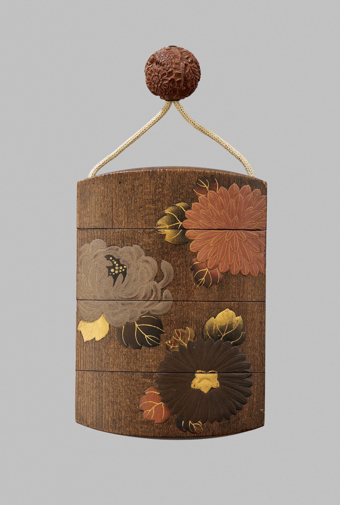 A LACQUERED LIGHT WOOD THREE-CASE INRO WITH CHRYSANTHEMUM AND PEONY