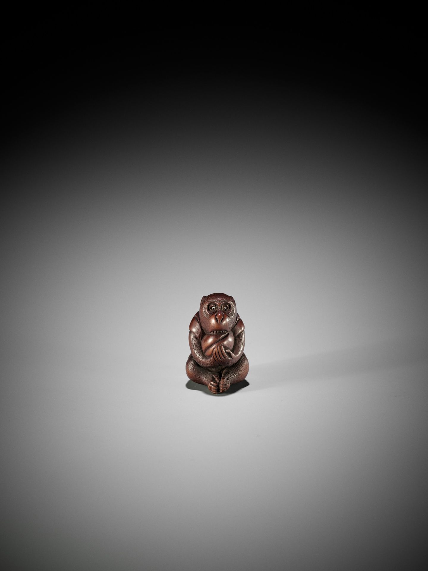 MASAKAZU: A WOOD NETSUKE OF A MONKEY WITH PEACH, SCHOOL OF TOMOKAZU - Image 2 of 10