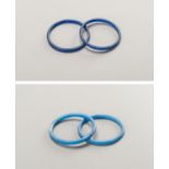 FOUR BLUE GLASS BANGLES