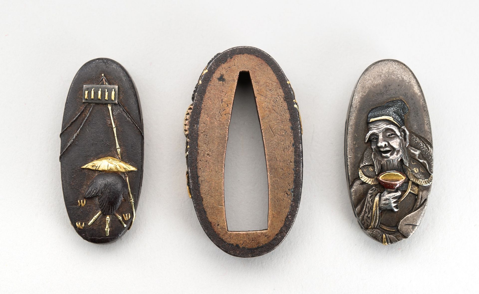 A GROUP OF TWO KASHIRA AND ONE FUCHI, 19th CENTURY