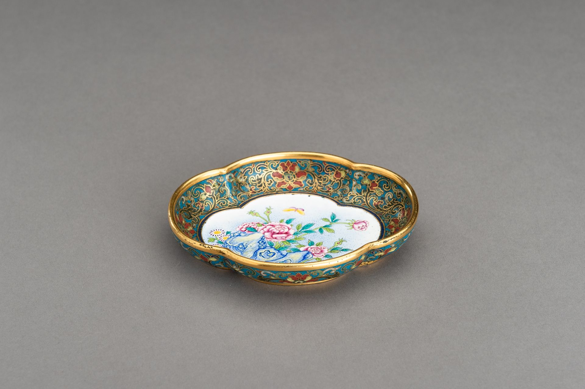 A LOBED CLOISONNE 'BUTTERFLY AND PEONIES' DISH, c. 1920s - Image 2 of 11