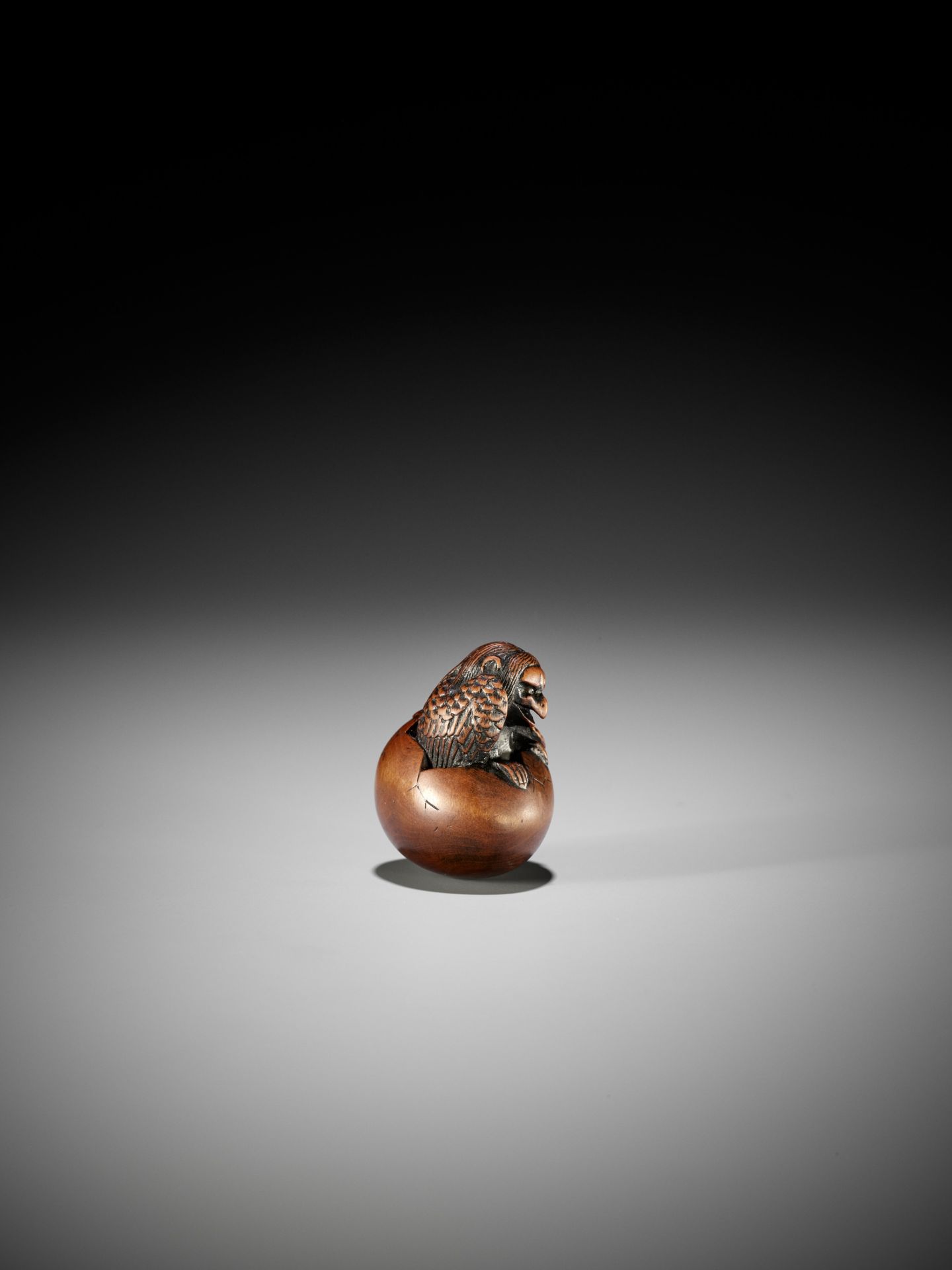 NAITO TOYOMASA: A FINE WOOD NETSUKE OF A HATCHING TENGU (TENGU NO TOMAGO) - Image 12 of 17