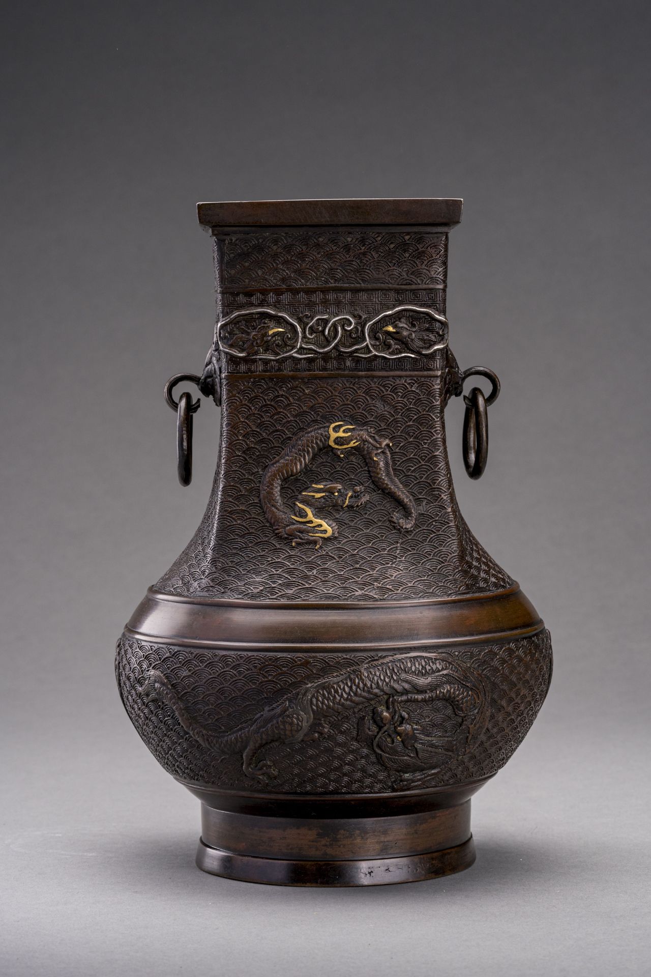 A GOLD AND SILVER INLAID BRONZE 'DRAGON' VASE, EDO