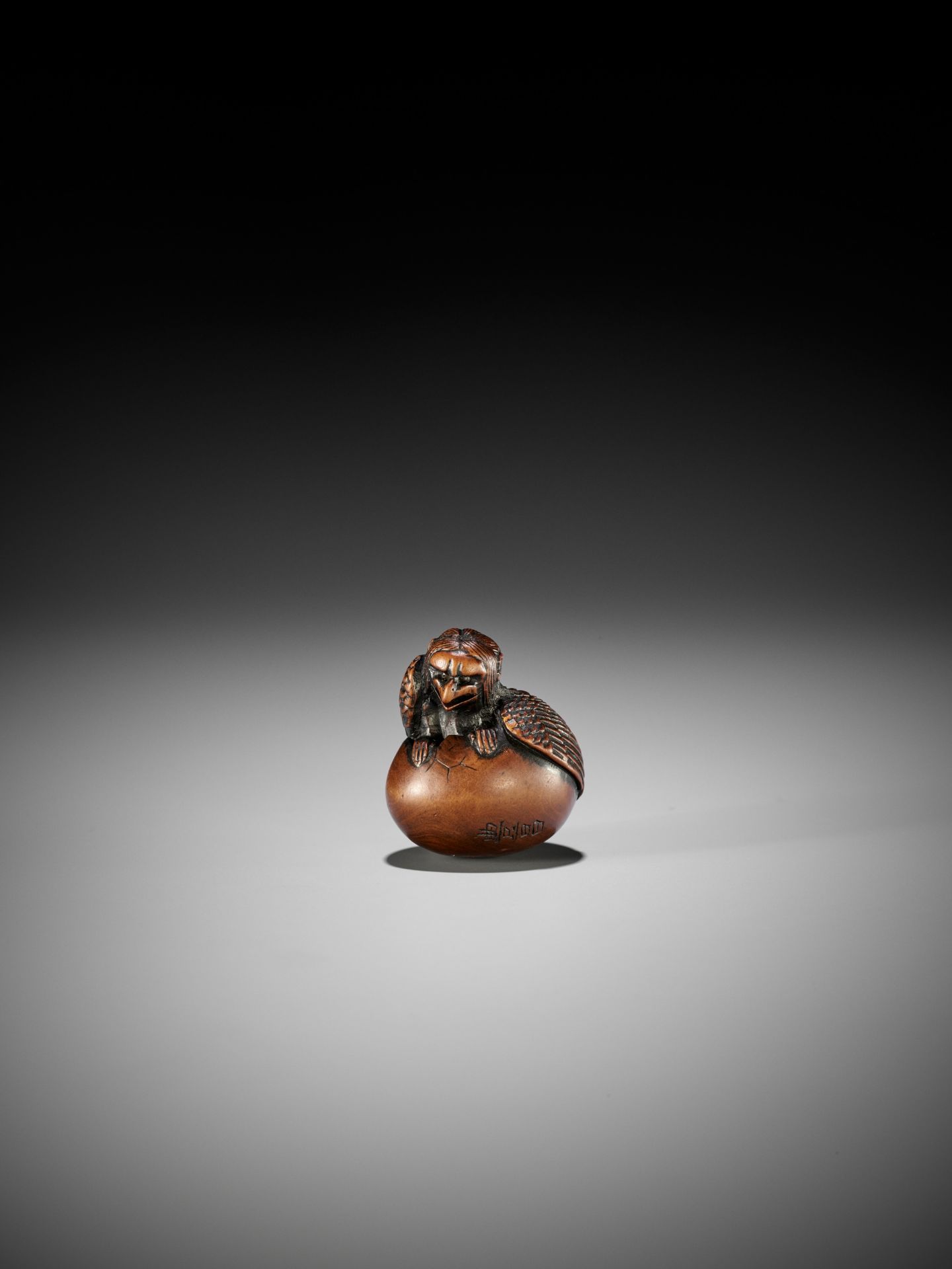 NAITO TOYOMASA: A FINE WOOD NETSUKE OF A HATCHING TENGU (TENGU NO TOMAGO) - Image 7 of 17