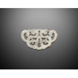 A FINE WHITE JADE PENDANT WITH TWO DRAGONS, EASTERN ZHOU