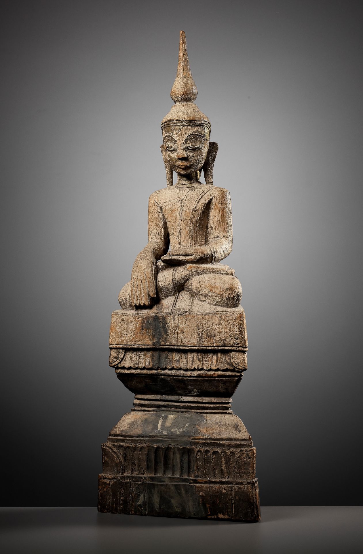 A LARGE SHAN STYLE WOOD CARVING OF BUDDHA