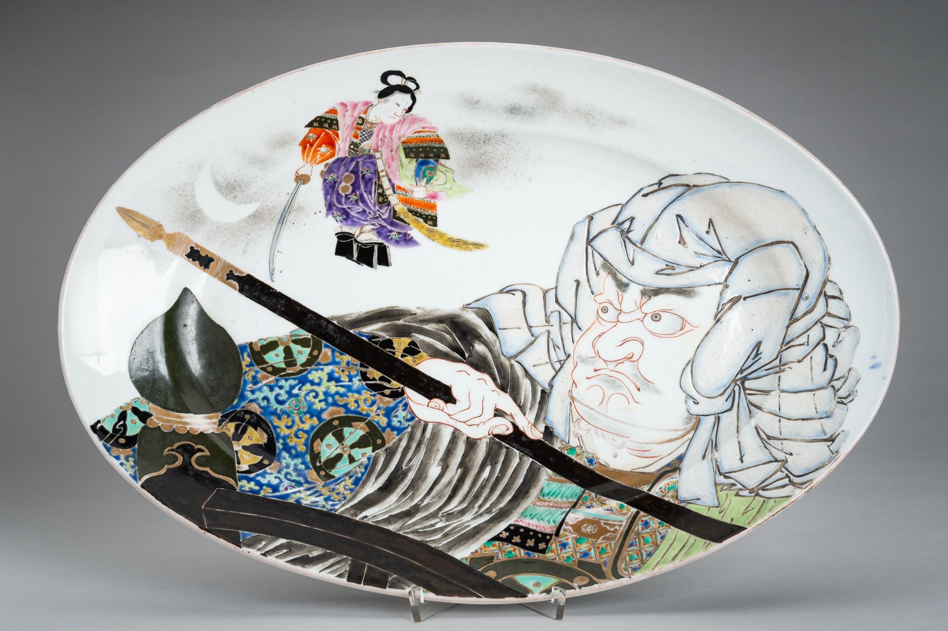 A LARGE PORCELAIN PLATE WITH BENKEI AND USHIWAKAMARU, MEIJI PERIOD