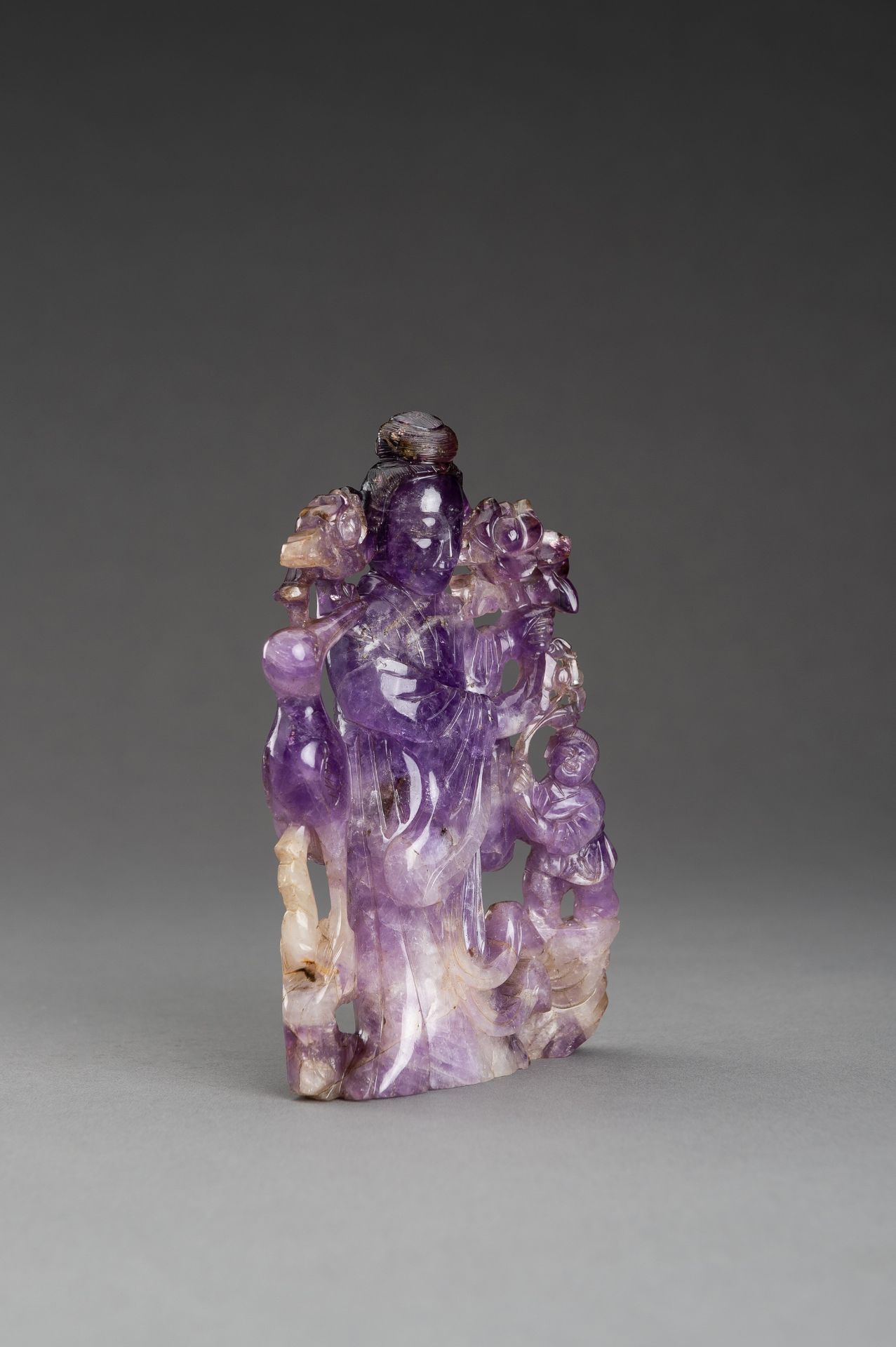 AN AMETHYST GROUP OF MAGU, 1900s - Image 6 of 11
