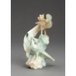 A JADEITE FIGURE OF A PHOENIX AND MAGPIE