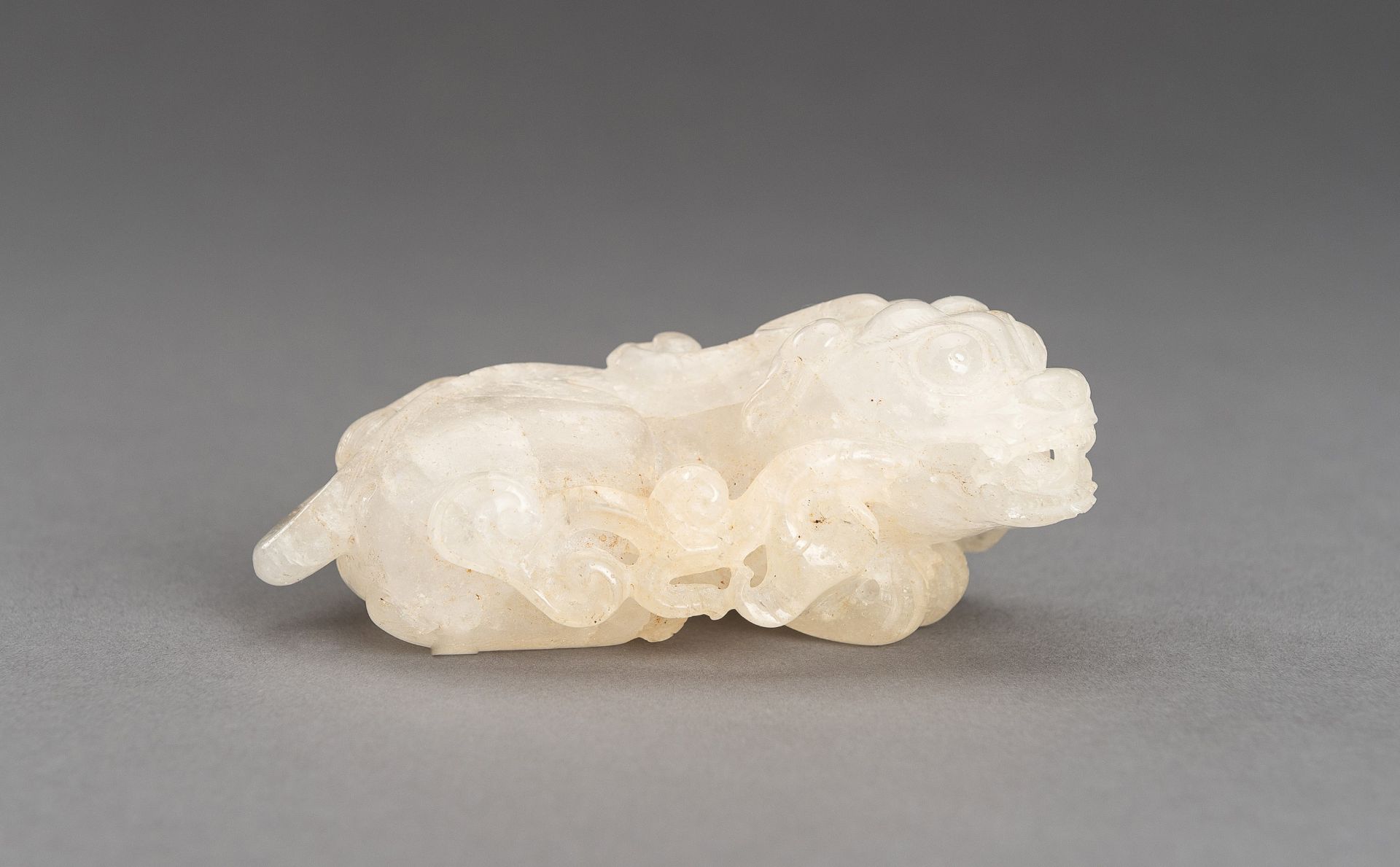 A FINE ROCK CRYSTAL 'BIXIE AND LINGZHI' FIGURE, QING DYNASTY