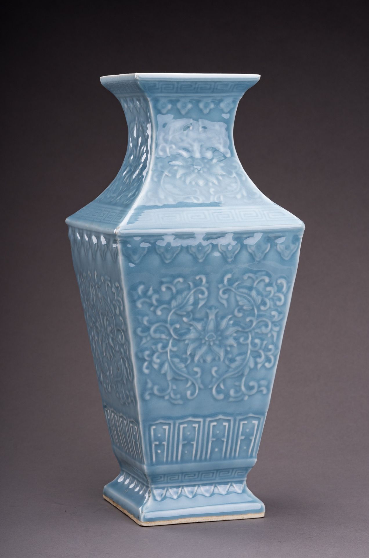 A PALE BLUE GLAZED SQUARE PORCELAIN BALUSTER VASE