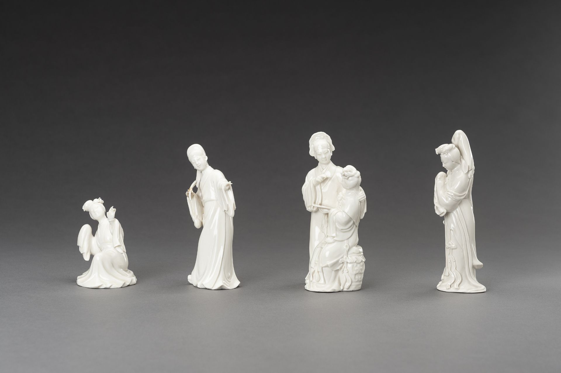 A SET OF FOUR DEHUA PORCELAIN FIGURINES, c. 1950s - Image 2 of 16