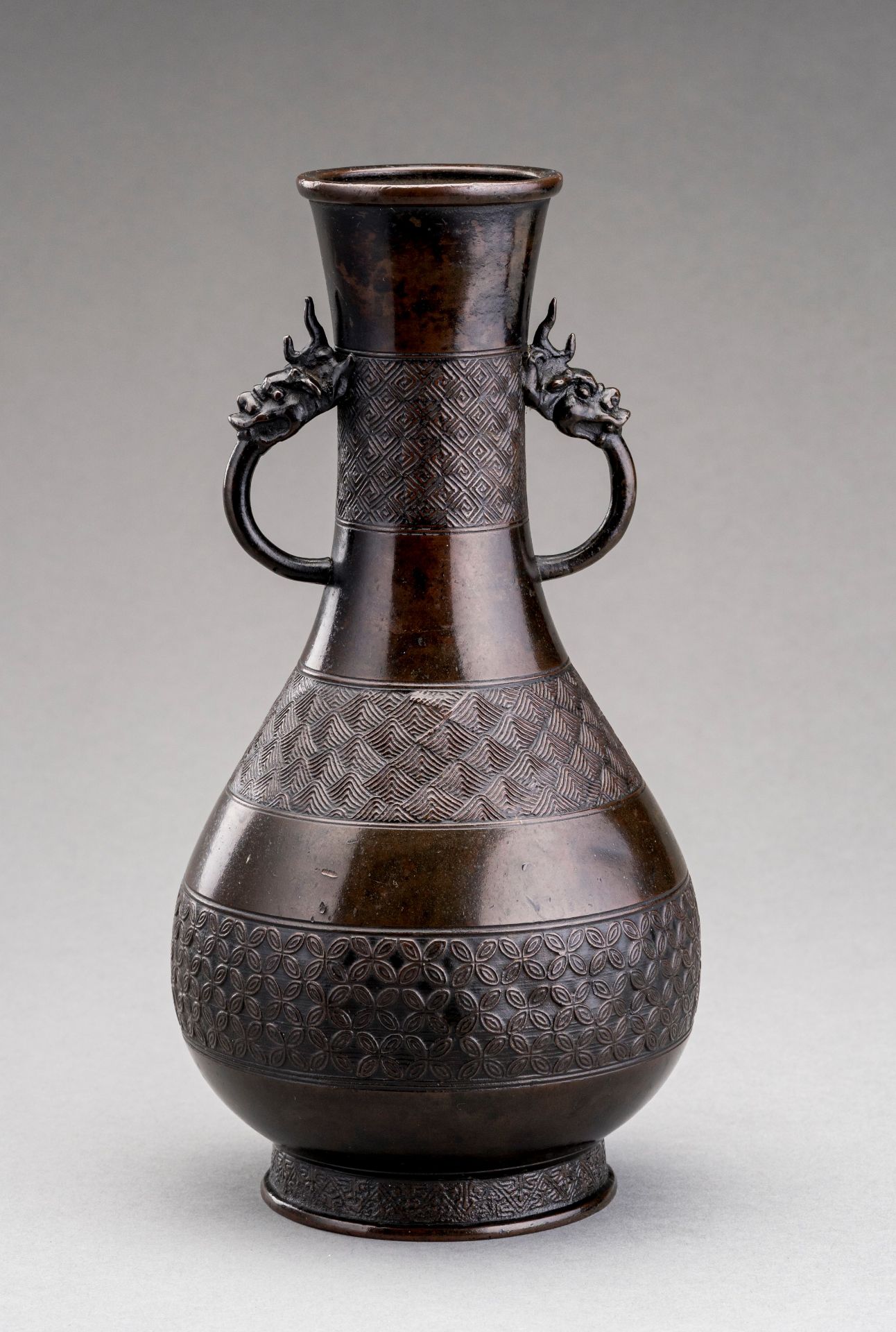 AN ARCHAISTIC BRONZE 'DRAGON' VASE, MING DYNASTY