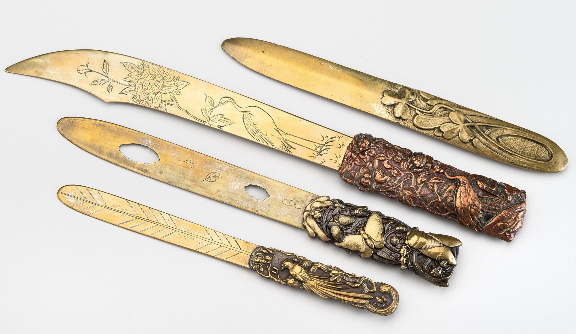 A GROUP OF FOUR MIXED METAL PAGE TURNERS, MEIJI