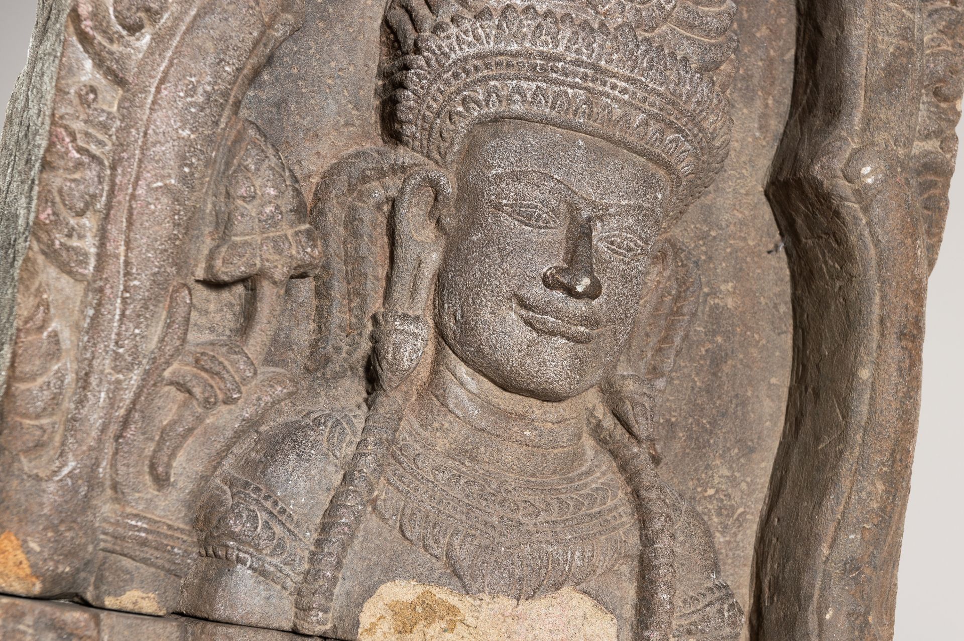 A VERY LARGE KHMER-STYLE SANDSTONE FIGURE OF AN APSARA, c. 1920s - Image 10 of 15