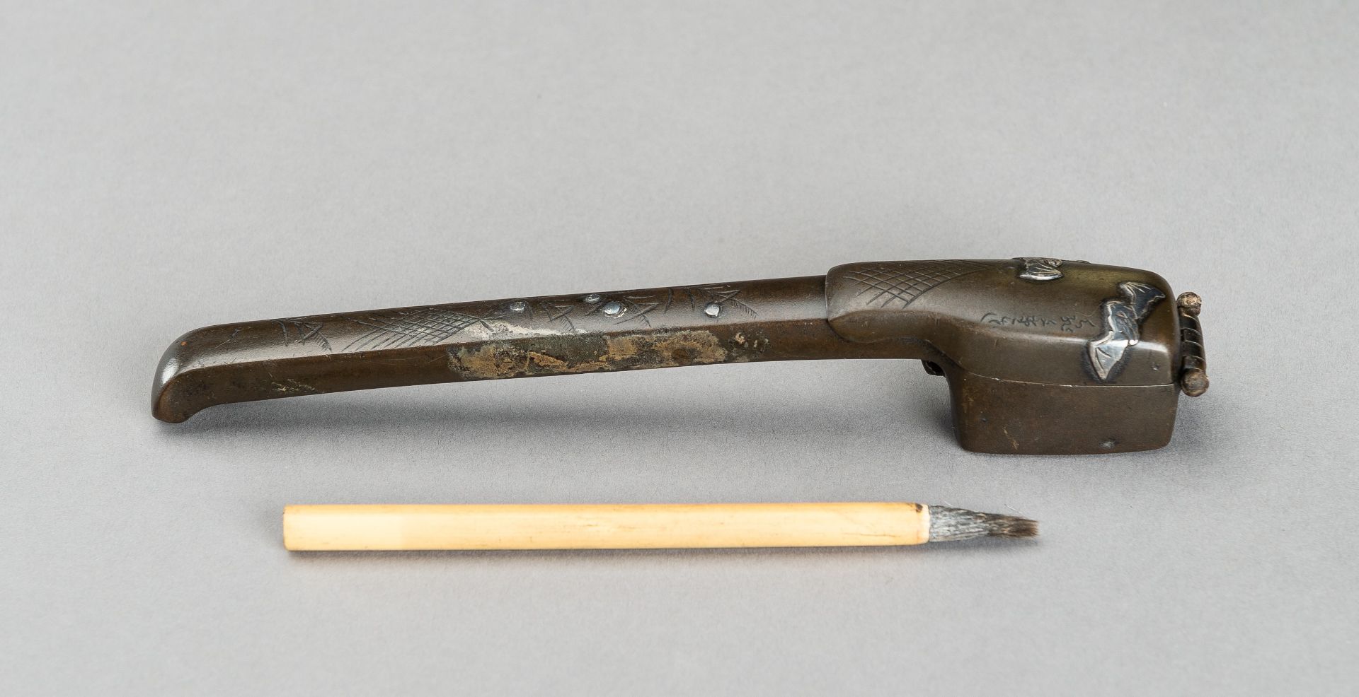 RYUBUNDO: A SILVER INLAID BRONZE 'BATS' YATATE, EDO