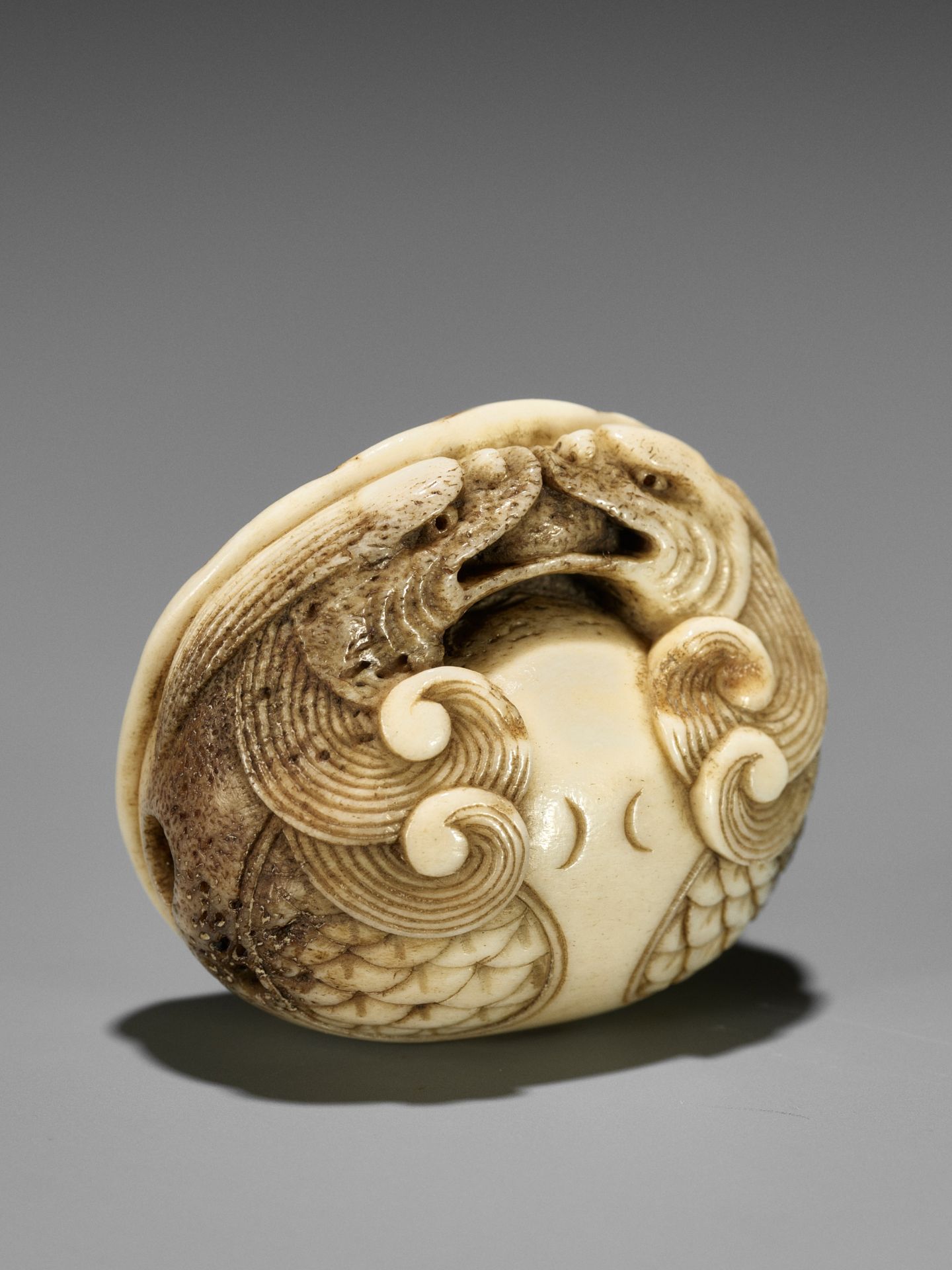 A FINE STAG ANTLER NETSUKE OF A DOUBLE DRAGON-HEADED MOKUGYO - Image 2 of 11