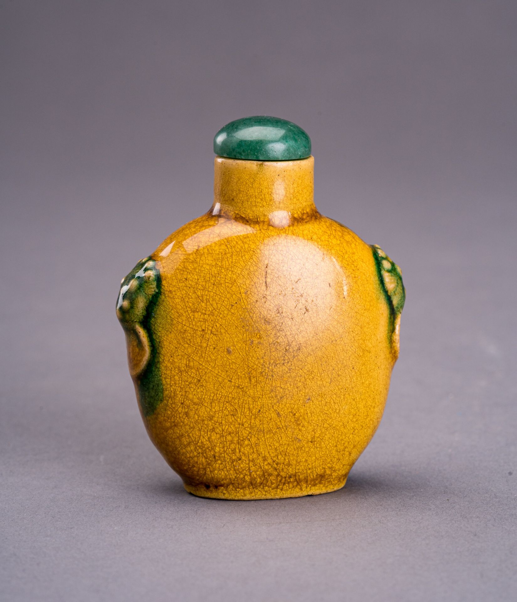 A YELLOW GLAZED CERAMIC SNUFF BOTTLE, c. 1920s