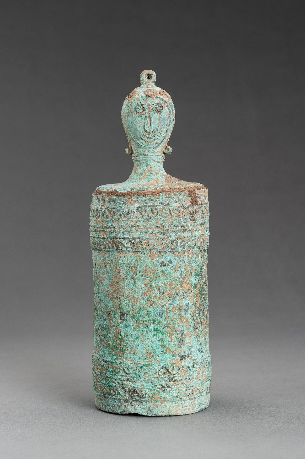 A LIDDED ANTHROPOMORPHIC BRONZE LIME CONTAINER