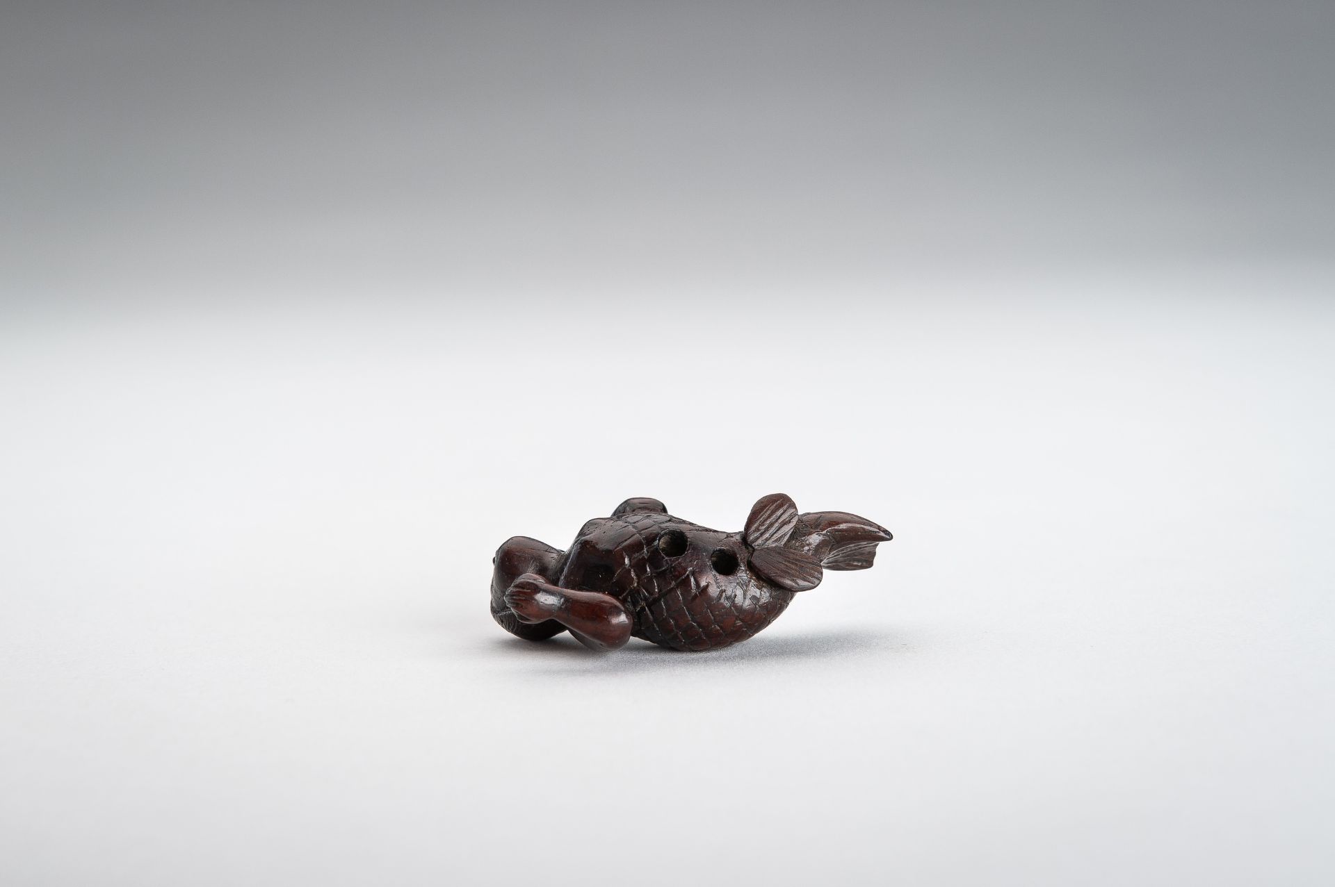 A WOOD NETSUKE OF A SWIMMING NINGYO (MERMAID) - Image 10 of 10