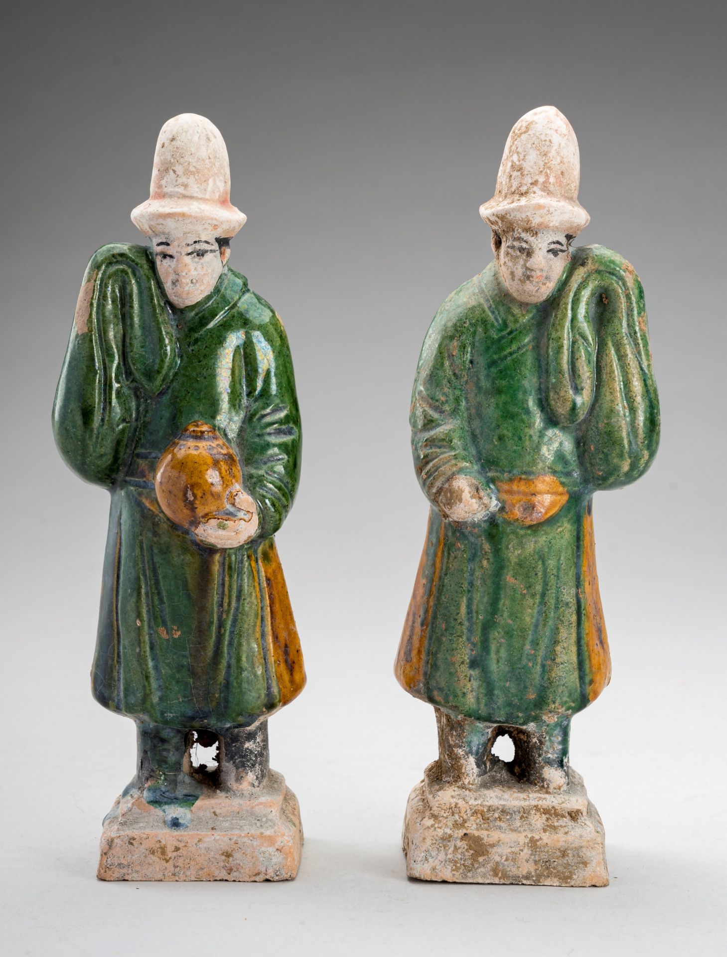 TWO SANCAI-GLAZED POTTERY FIGURES OF ATTENDANTS