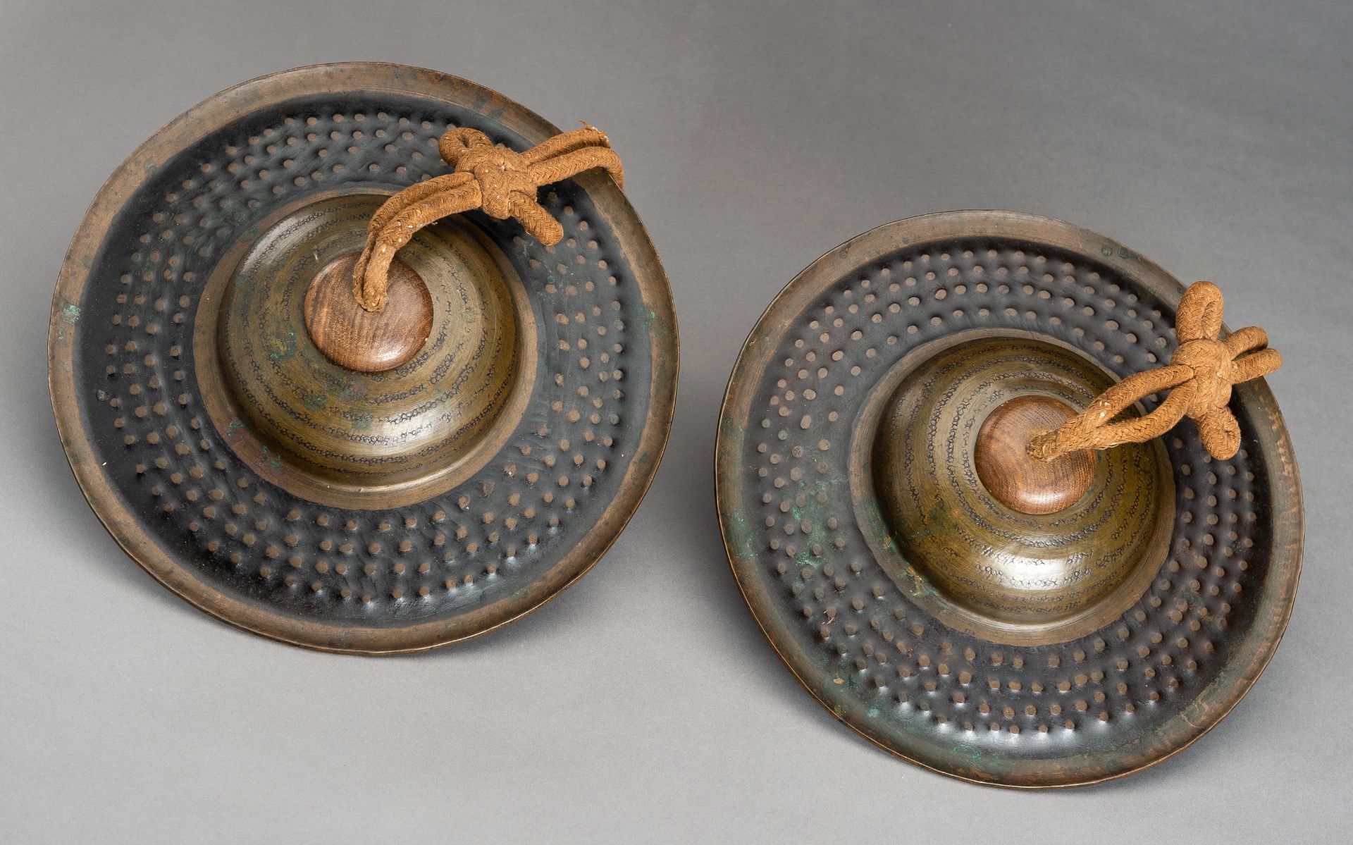 A PAIR OF BRONZE CYMBALS