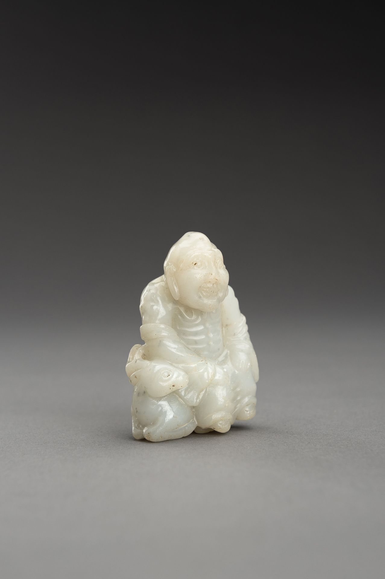 A WHITE JADE GROUP OF A LUOHAN AND DEER - Image 3 of 10