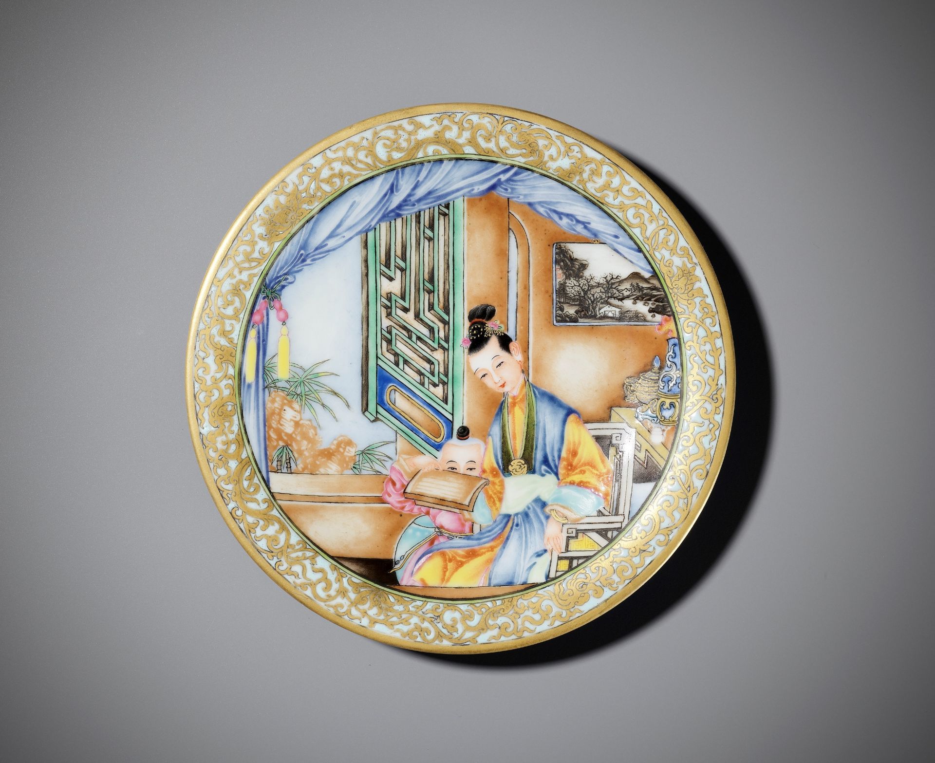 A GILT-DECORATED FAMILLE ROSE DISH