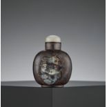 AN OPAL MATRIX 'LEAPING TIGER' SNUFF BOTTLE, QING DYNASTY