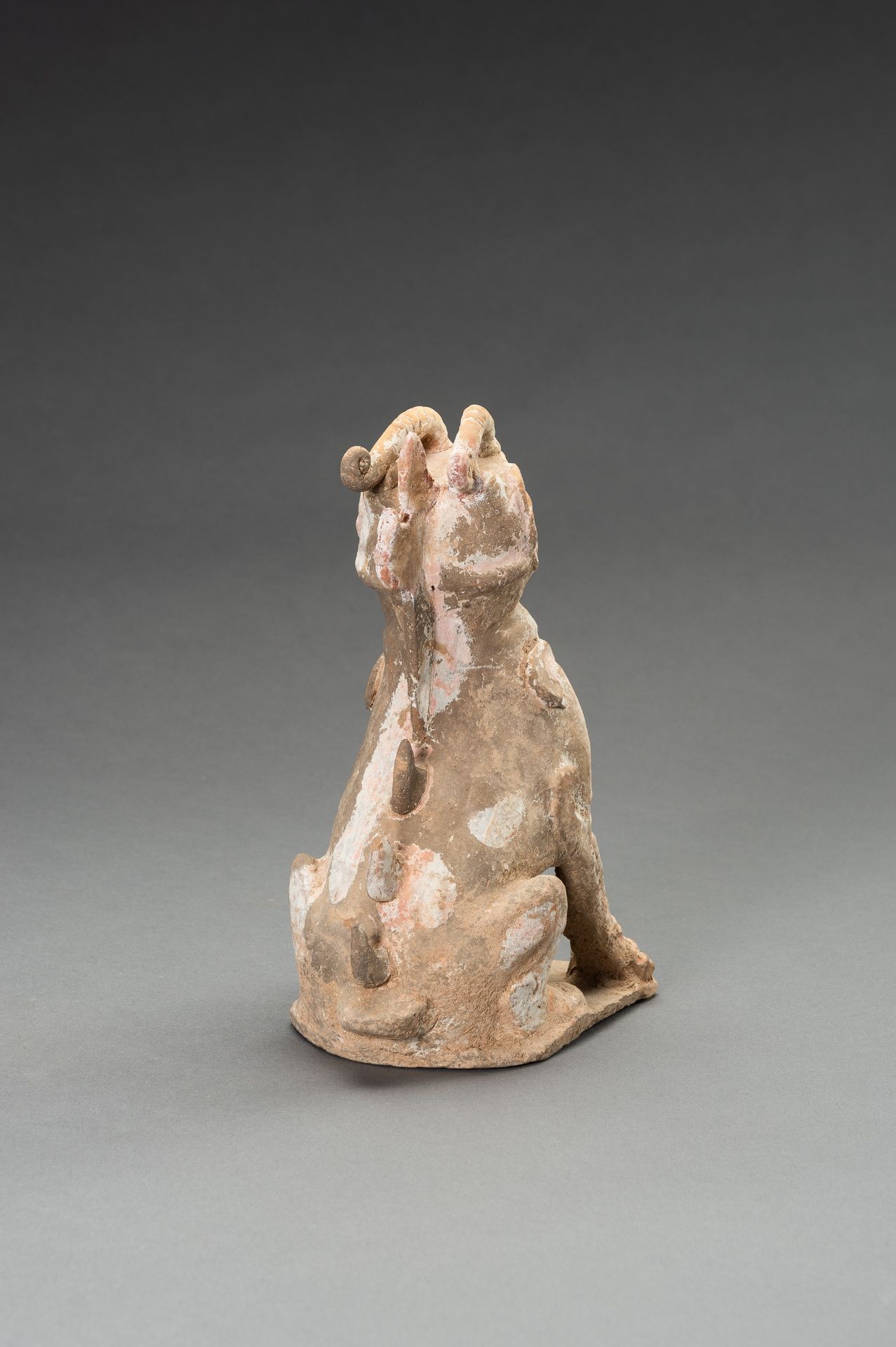 A POTTERY FIGURE OF A HORNED GUARDIAN BEAST, TANG DYNASTY OR EARLIER - Image 12 of 13