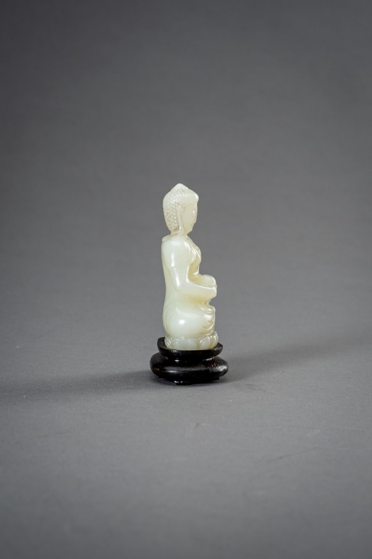 A PALE CELADON JADE FIGURE OF BUDDHA, 1930s - Image 6 of 9