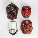 A MIXED LOT WITH FOUR LACQUERED NOH MASKS