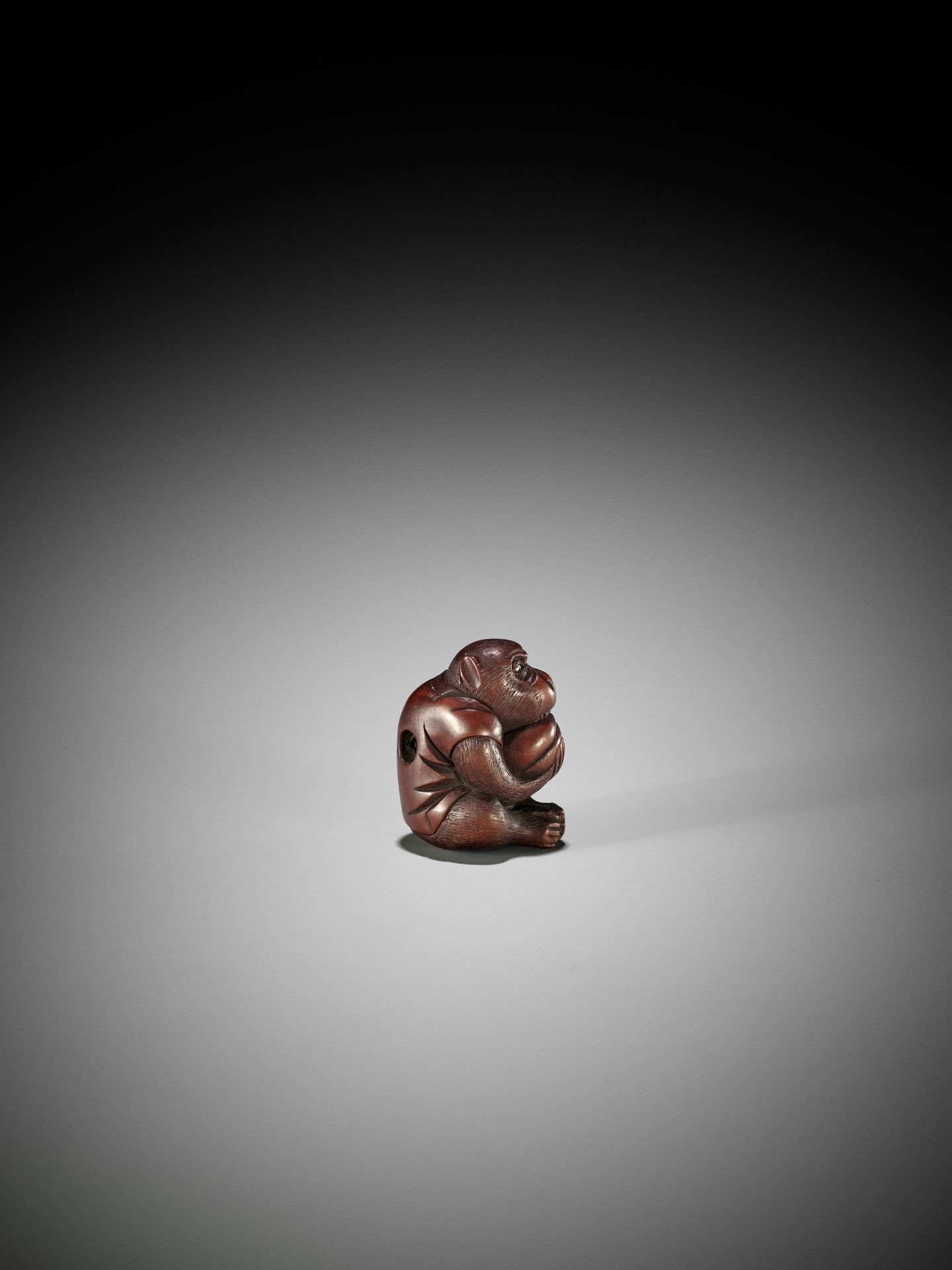 MASAKAZU: A WOOD NETSUKE OF A MONKEY WITH PEACH, SCHOOL OF TOMOKAZU - Image 8 of 10