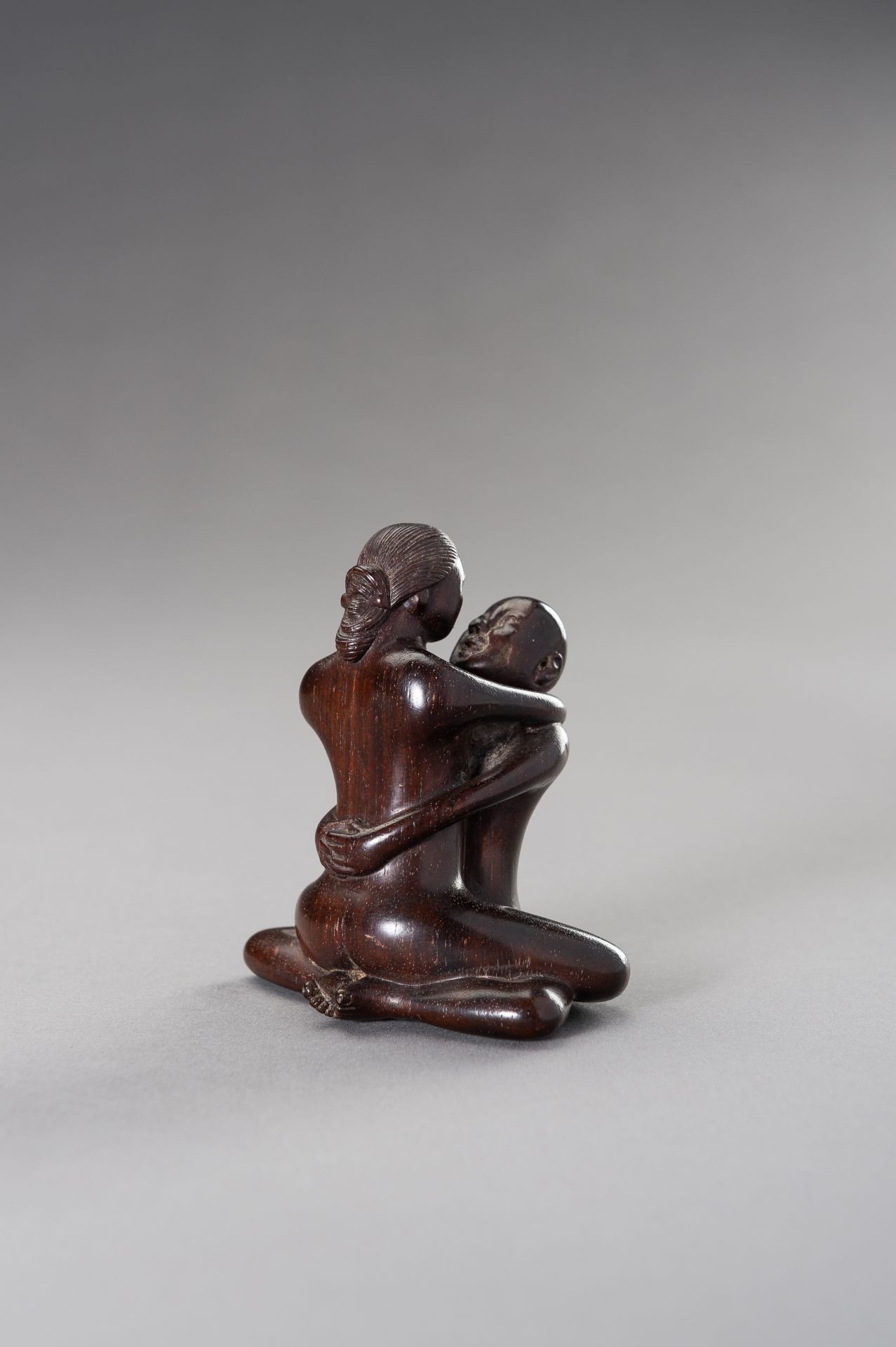 A ZITAN WOOD FIGURE OF A COUPLE IN EROTIC EMBRACE - Image 2 of 12