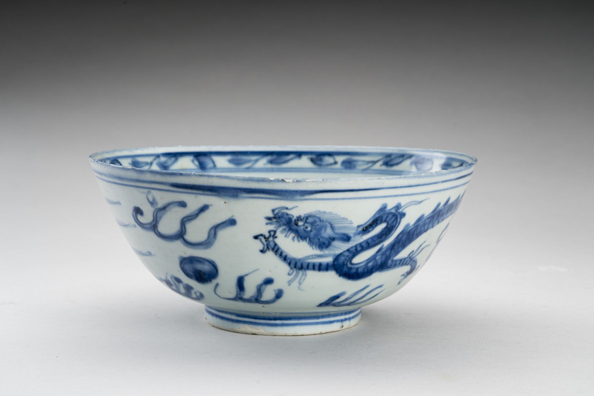 A BLUE AND WHITE PORCELAIN 'DRAGON AND PHOENIX' BOWL, 'HATCHER CARGO'