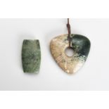 AN ARCHAISTIC LOT WITH A JADE AND A SERPENTINE PENDANT