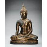 A LARGE LACQUER-GILT BRONZE FIGURE OF BUDDHA SHAKYAMUNI