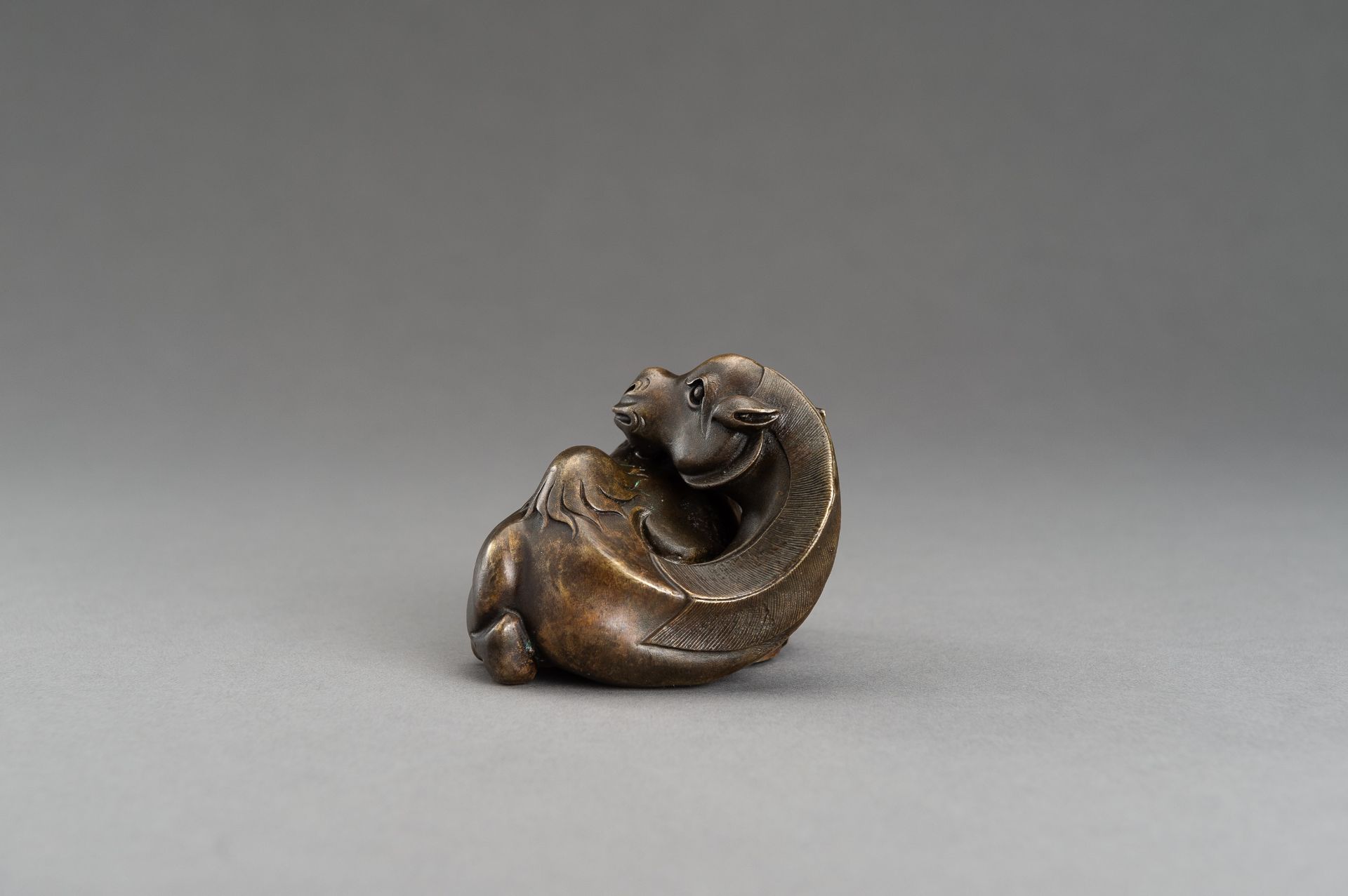 A BRONZE SCROLL WEIGHT OF A BACTRIAN CAMEL, QING - Image 4 of 12