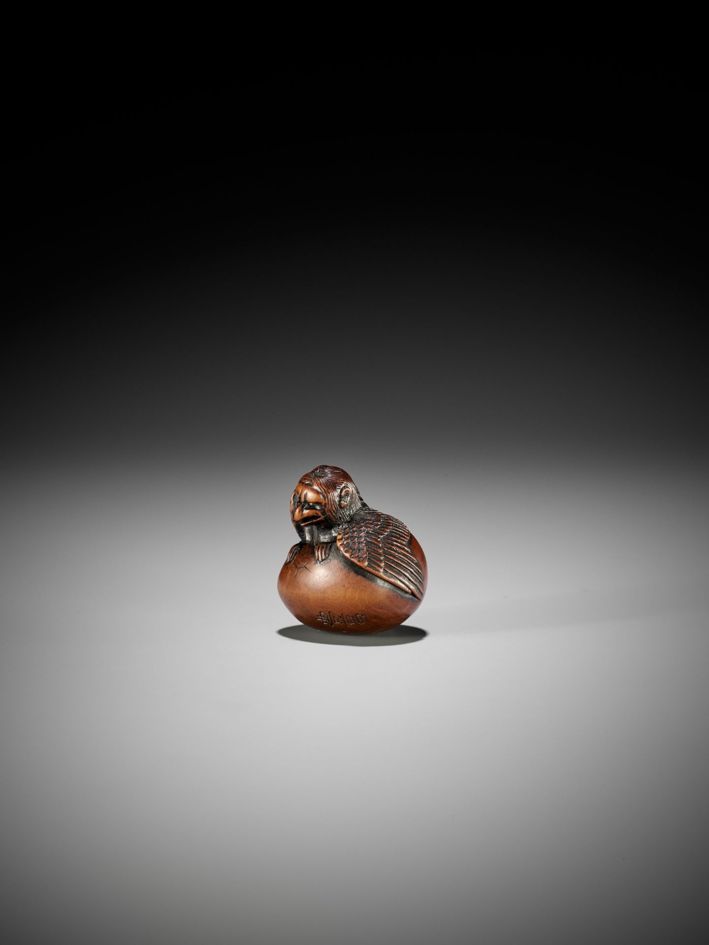 NAITO TOYOMASA: A FINE WOOD NETSUKE OF A HATCHING TENGU (TENGU NO TOMAGO) - Image 9 of 17