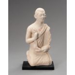 A STUCCO FIGURE OF A MONK, GANDHARA