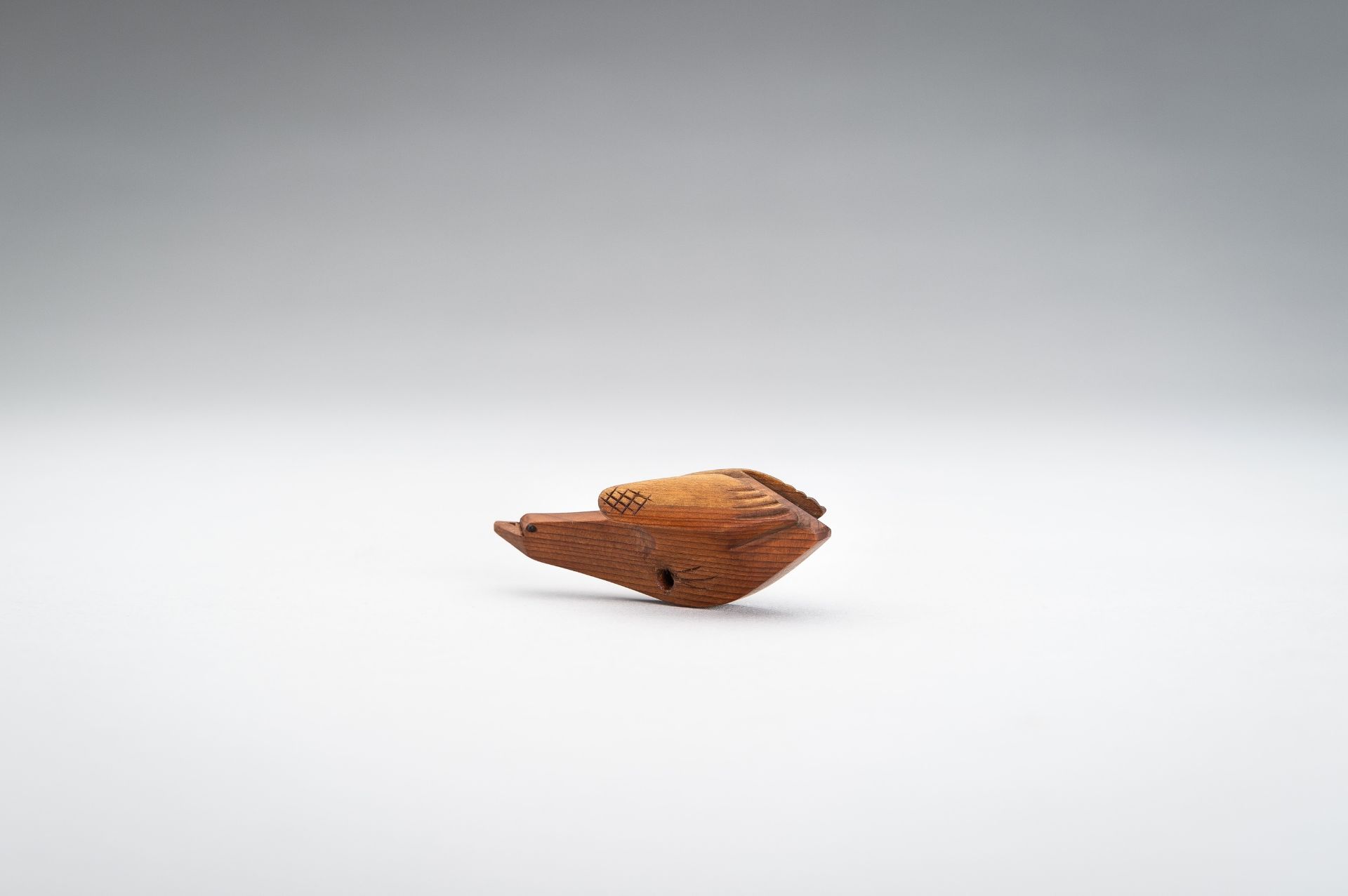 SUKETOMO: A HIDA SCHOOL ITTOBORI WOOD NETSUKE OF A BIRD - Image 5 of 11