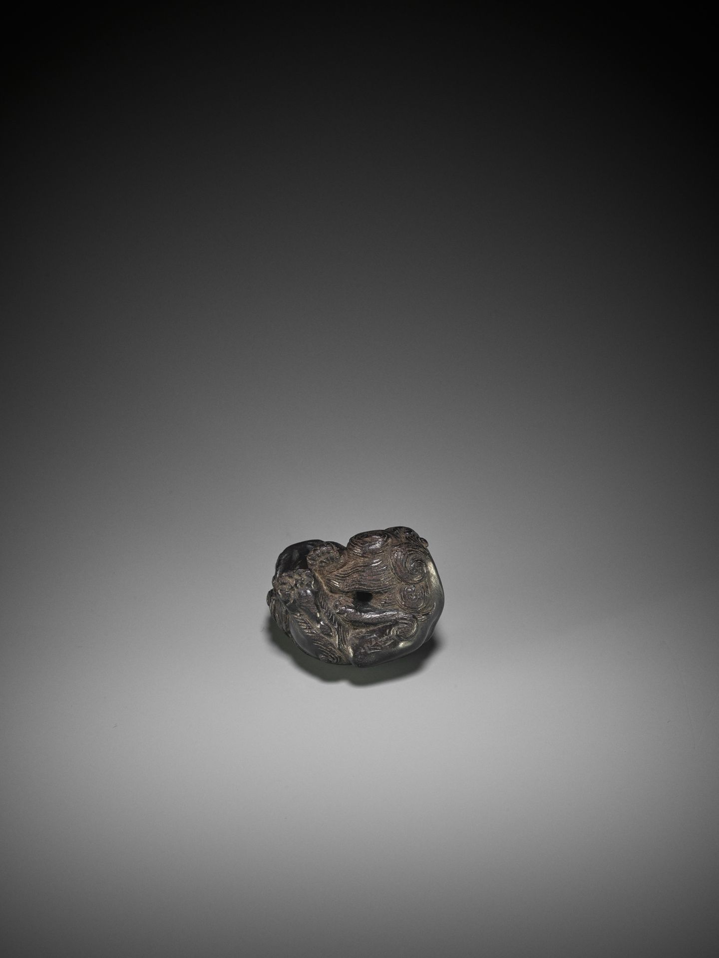 KOKEI: A RARE EBONY WOOD NETSUKE OF A SHISHI SCRATCHING HIS EAR - Image 9 of 10