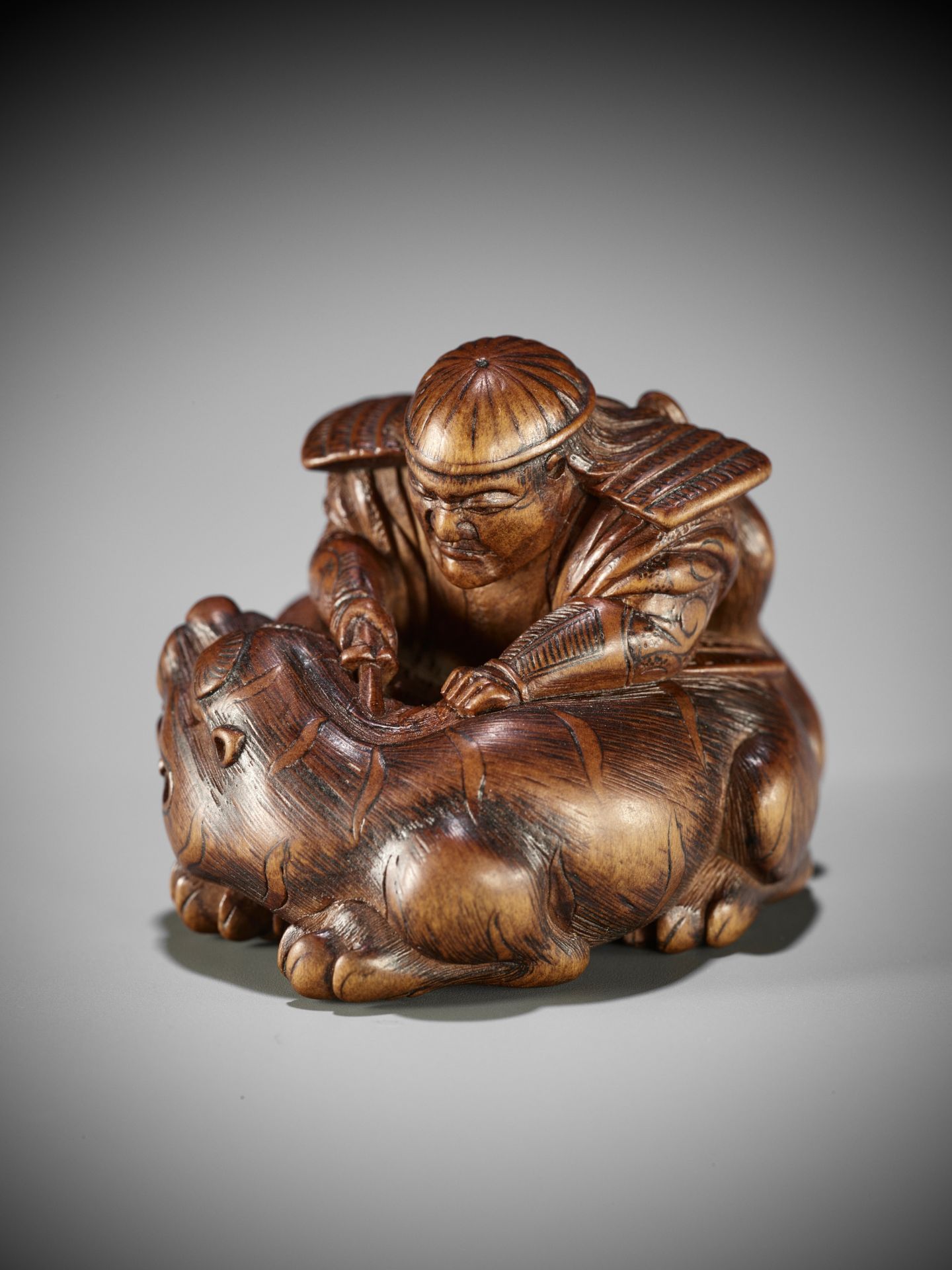 MASAKATA: A FINE AND RARE WOOD NETSUKE OF HADESU SLAYING THE TIGER - Image 3 of 17